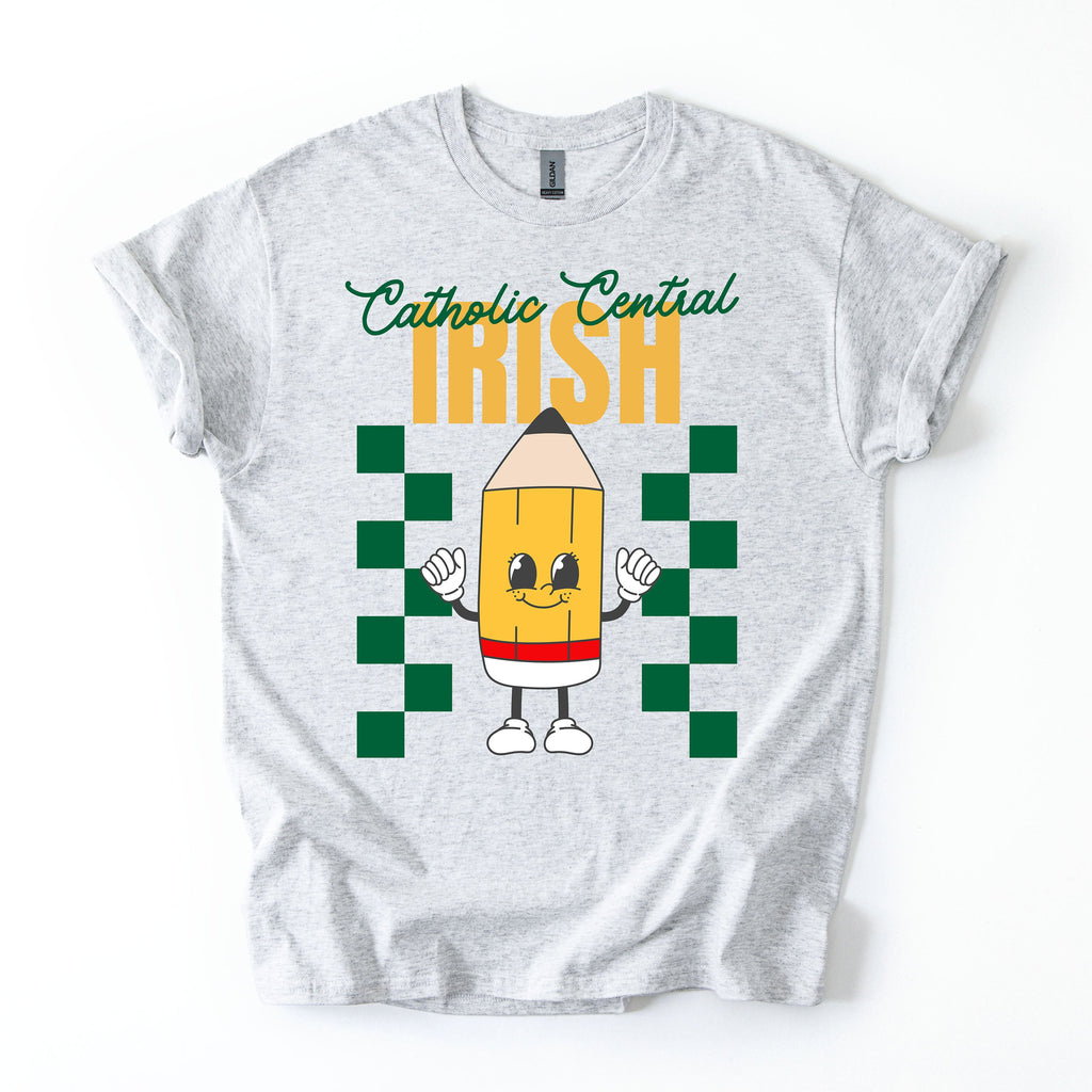 White t-shirt with a colorful design featuring a pencil character and text "Catholic Central Irish" on a white background